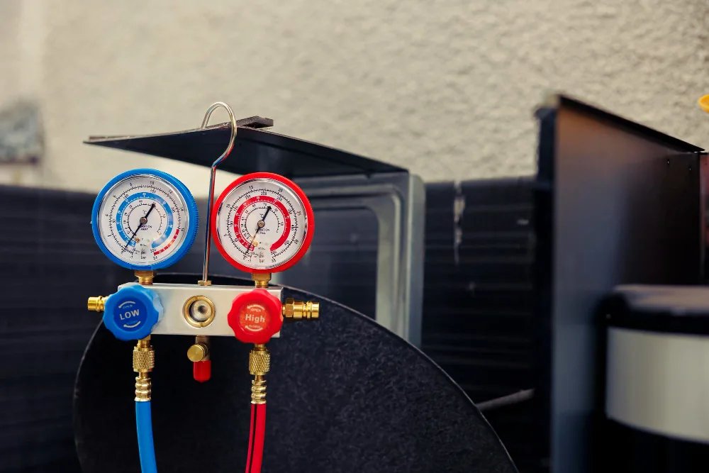 Refrigerant pressure gauges used during AC inspection
